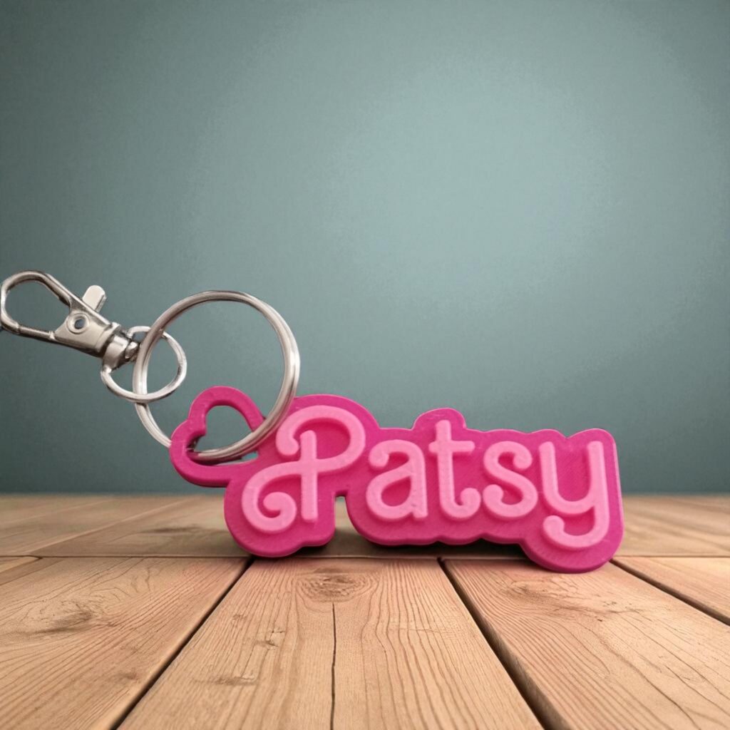 Real pink personalised Patsy name keyring with its metal key ring